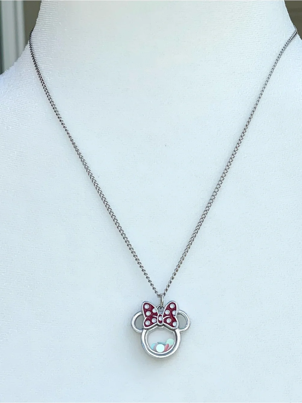 Minnie Mouse shaker charm on silver chain.